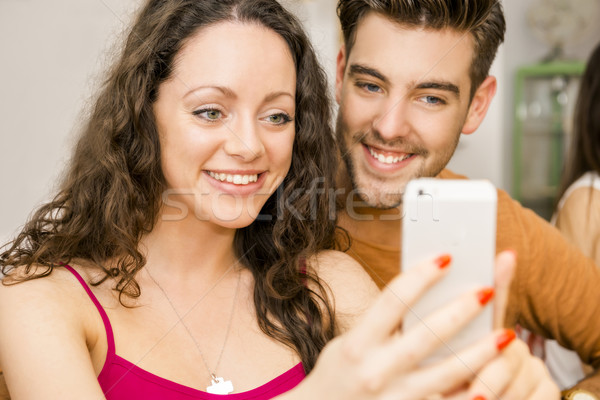 Happy couple making a selfie Stock photo © iko