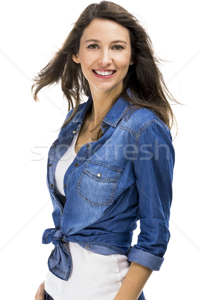 Gyönyörű nő gyönyörű vonzó nő visel farmer póló Stock fotó © iko