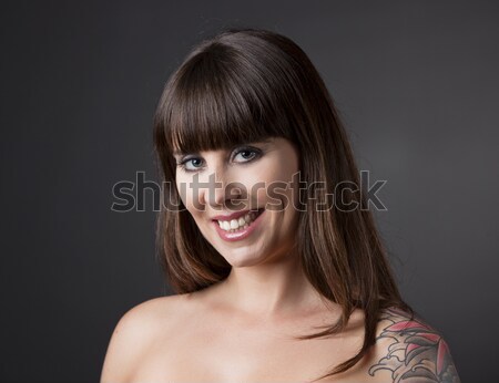 Mulher sorrindo retrato naturalismo cinza mulheres feliz Foto stock © iko