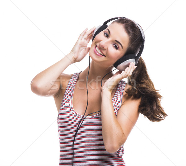 Beautiful woman listen music Stock photo © iko