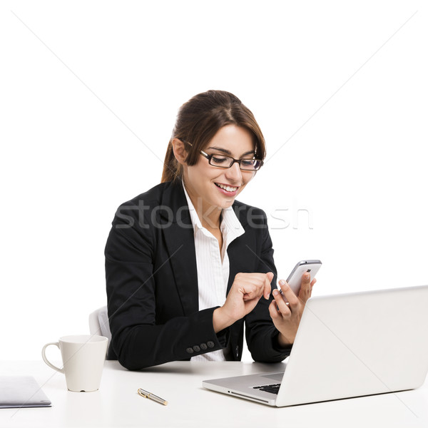 Businesswoman answering phone Stock photo © iko