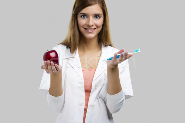 Weiblichen Zahnarzt schönen halten Werkzeuge Stock foto © iko