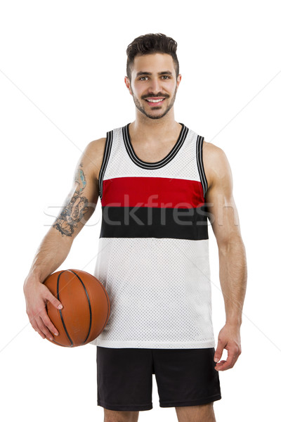 Sportlich Mann halten legen Ball Stock foto © iko