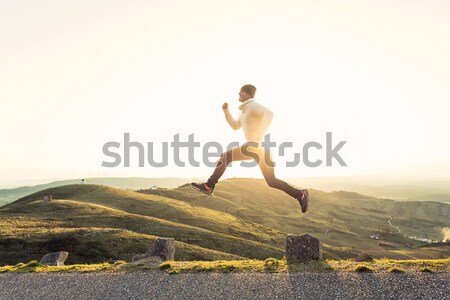 Homme sautant extérieur courir heureux sport [[stock_photo]] © iko