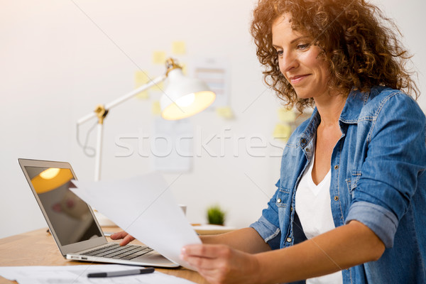 Woman working at the office Stock photo © iko