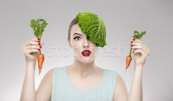 Veganistisch meisje portret vrouw wortelen Stockfoto © iko