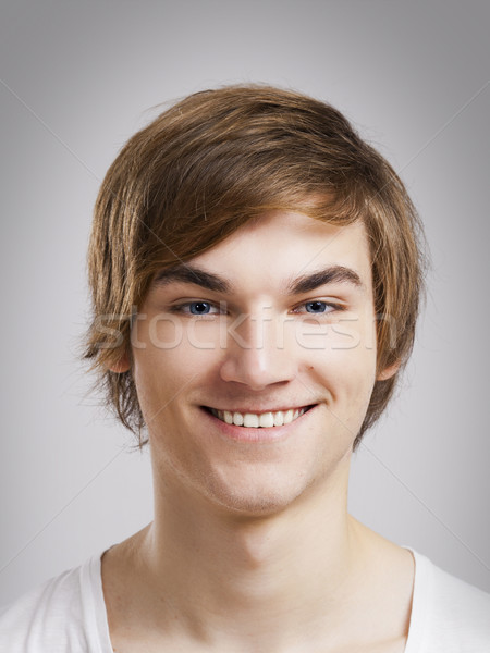счастливое лицо портрет красивый молодым человеком серый улыбка Сток-фото © iko