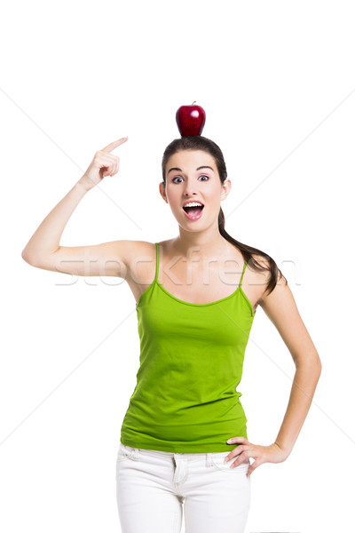 Saine femme pointant pomme tête isolé [[stock_photo]] © iko