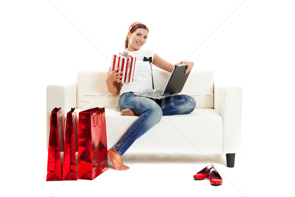 Vásárlás otthon gyönyörű fiatal nő online bolt Stock fotó © iko