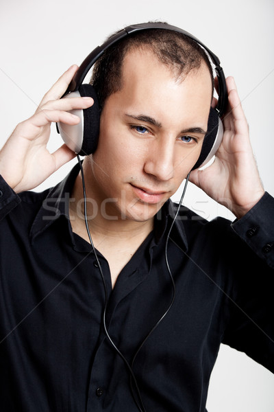 Zdjęcia stock: Słuchać · muzyki · portret · młody · człowiek · słuchania · słuchawki