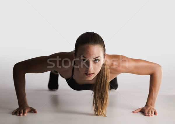 Kihívás lövés nő lány test fitnessz Stock fotó © iko