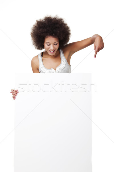 Nő tart fehér óriásplakát gyönyörű fiatal nő Stock fotó © iko