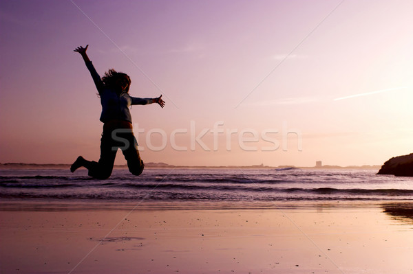 Springen strand vrouw oefening hemel sport Stockfoto © iko