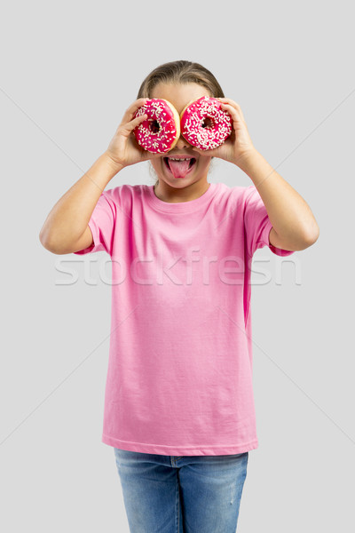 Szeretet fánkok stúdió portré gyönyörű kislány Stock fotó © iko