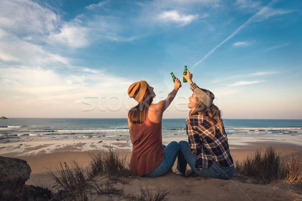 Making a toast on the beach Stock photo © iko