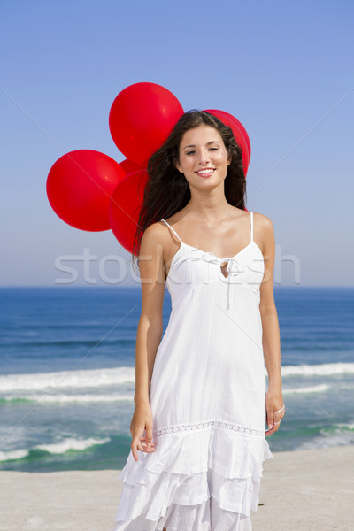 Belle fille rouge femme plage ciel [[stock_photo]] © iko