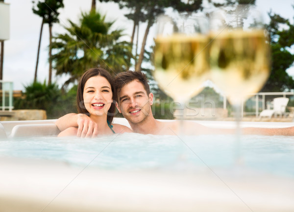 Stock photo: Tasting wine in a jacuzzi