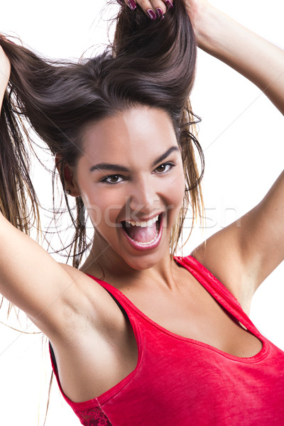 Woman grabbing her hair Stock photo © iko