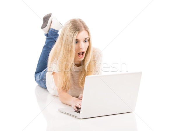 Woman working on a laptop Stock photo © iko