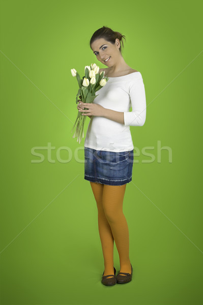 Happy girl with tulips Stock photo © iko