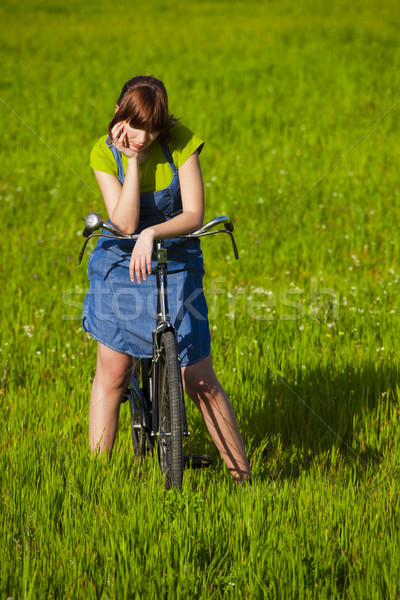 Nostálgico menina mulher jovem bicicleta belo primavera Foto stock © iko