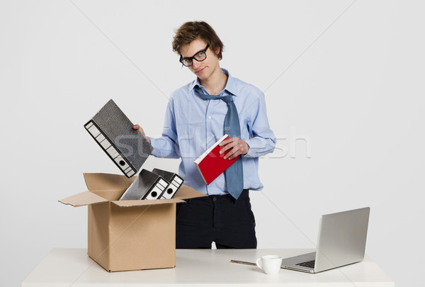 Csomagol felfelé fiatalember iroda üzlet férfi Stock fotó © iko