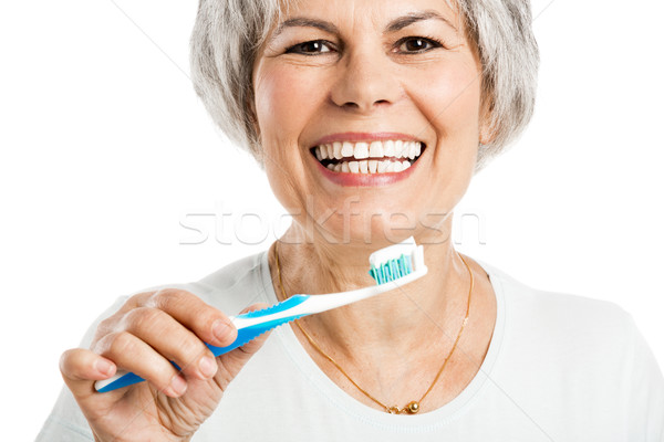 Brushing teeth Stock photo © iko