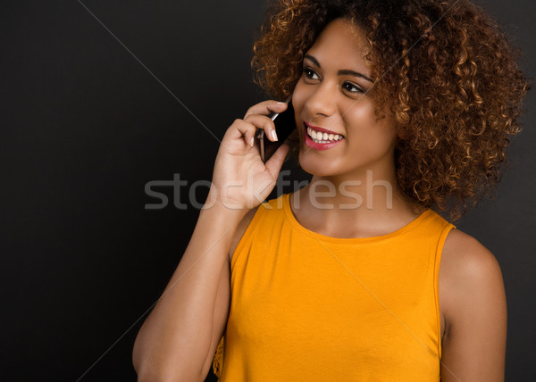 Telefoon beste vriend mooie afro-amerikaanse vrouw Stockfoto © iko