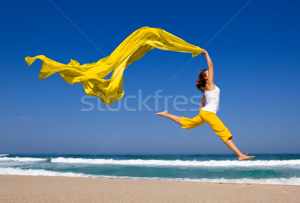 ストックフォト: ジャンプ · 美しい · 若い女性 · ビーチ
