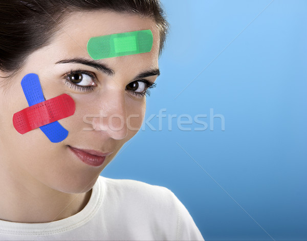 Stock photo: Woman with bandages on the face