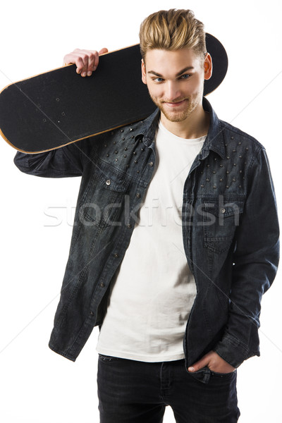 Joven skateboard estudio retrato posando deporte Foto stock © iko