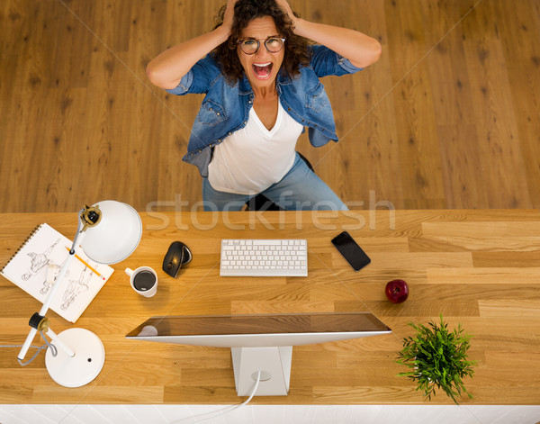 Stressed woman working Stock photo © iko