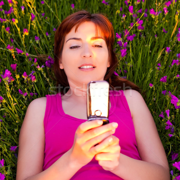 Girl talking on cellphone Stock photo © iko