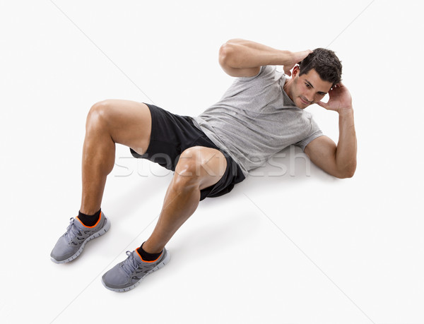 Man doing abdominals Stock photo © iko