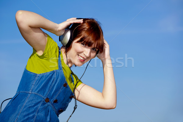 Heureux femme écouter musique portrait belle [[stock_photo]] © iko