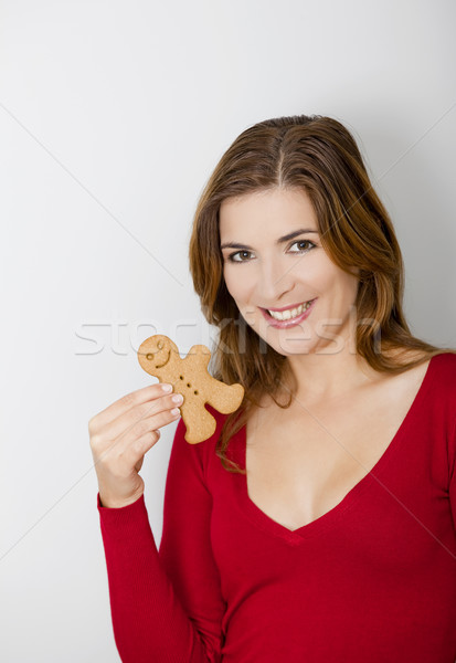 Woman with a Gingerbread cookie Stock photo © iko