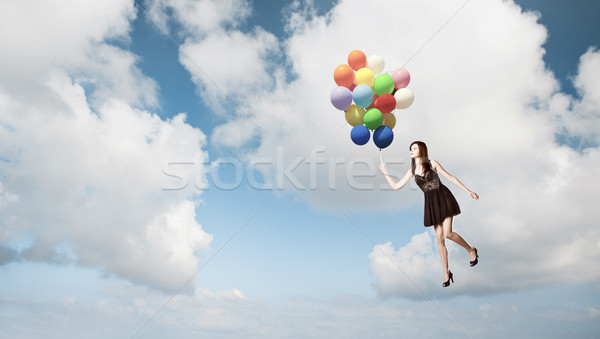 Flying with ballons Stock photo © iko