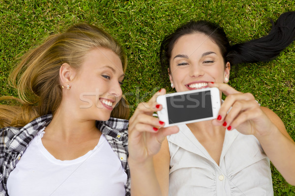 Stock photo: Best friends taking selfies