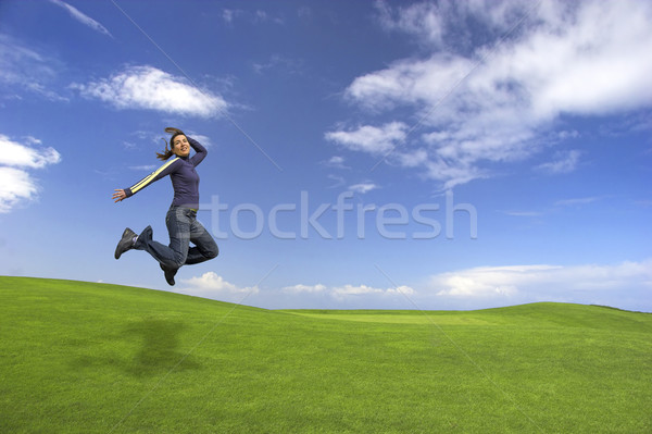 Sautant jeune femme vert domaine ciel sport [[stock_photo]] © iko