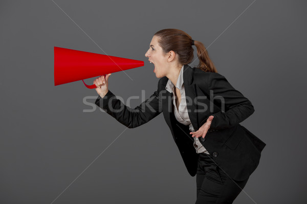 Woman with a megaphone Stock photo © iko