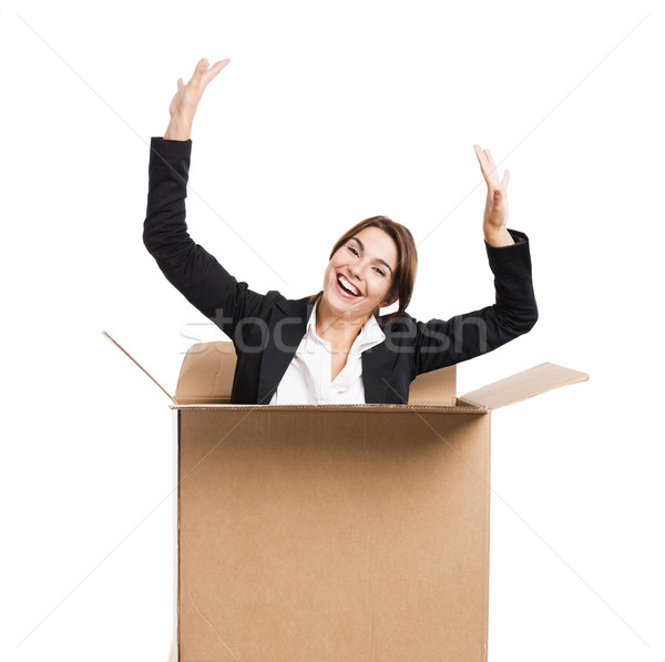 Business woman appear inside a big card box Stock photo © iko