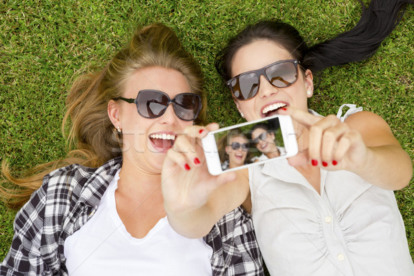 Best friends taking selfies Stock photo © iko