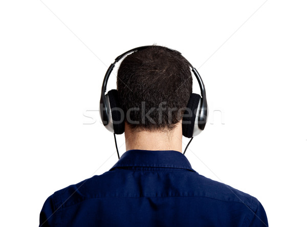 Ouvir música ver de volta moço escuta fones de ouvido Foto stock © iko