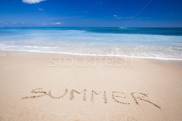 Сток-фото: лет · красивой · тропический · пляж · слово · написанный · песок
