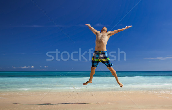 Stockfoto: Man · springen · strand · atletisch · jonge · man · genieten