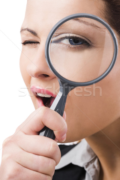 Business holding a magnifying glass Stock photo © iko