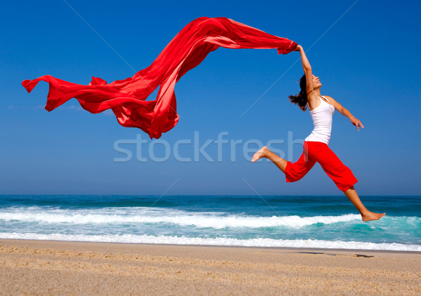 Foto stock: Saltando · belo · mulher · jovem · praia