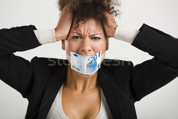 Covering mouth with a euro banknote Stock photo © iko