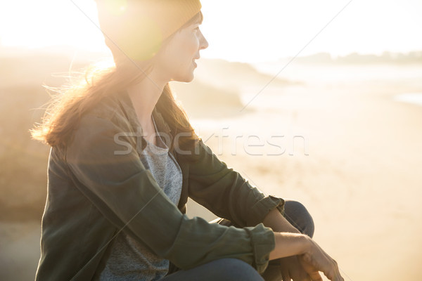 坐在 懸崖 佳人 海灘 女子 女孩 商業照片 © iko