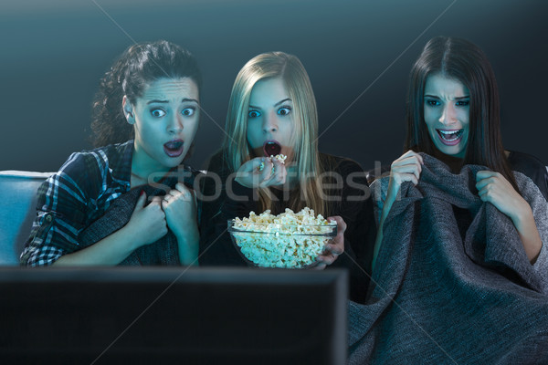 Paura adolescente guardare film ragazze adolescenti horror Foto d'archivio © iko